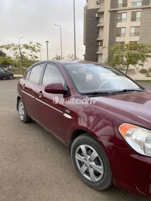 هيونداي اكسنت 2009 أحمر غامق مستعملة للبيع - 3