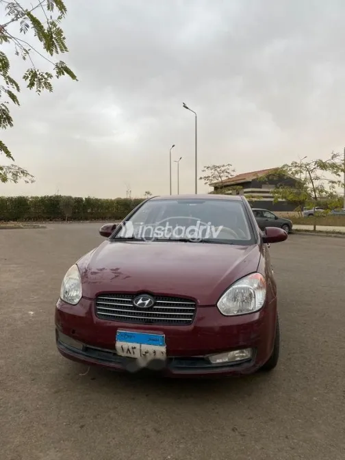 هيونداي اكسنت 2009 أحمر غامق مستعملة للبيع - 4