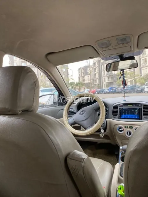 هيونداي اكسنت 2009 أحمر غامق مستعملة للبيع - 7