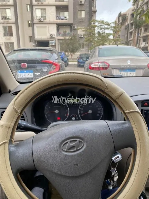 هيونداي اكسنت 2009 أحمر غامق مستعملة للبيع - 8