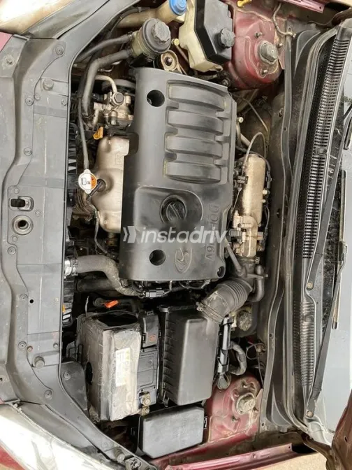 هيونداي اكسنت 2009 أحمر غامق مستعملة للبيع - 9