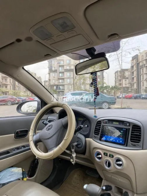 هيونداي اكسنت 2009 أحمر غامق مستعملة للبيع - 10