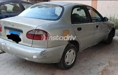 دايو لانوس 1999 ذهبي مستعملة للبيع - 5