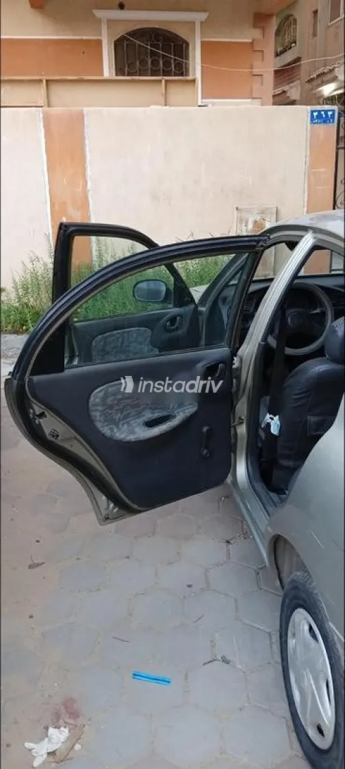 دايو لانوس 1999 ذهبي مستعملة للبيع - 8