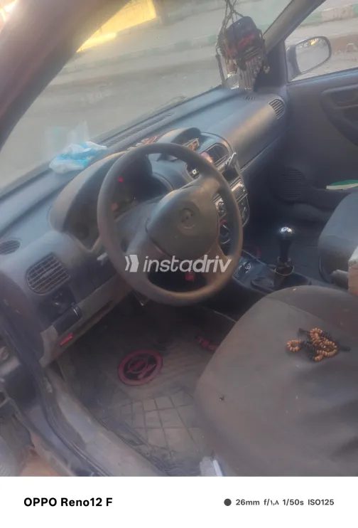 اوبل كورسا 2005 أبيض مستعملة للبيع - 3