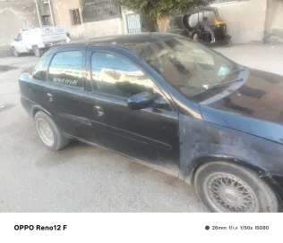 اوبل كورسا 2005 أبيض مستعملة للبيع