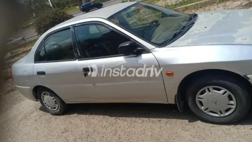 ميتسوبيشي لانسر كرستالة 1999 فضي مستعملة للبيع - 2