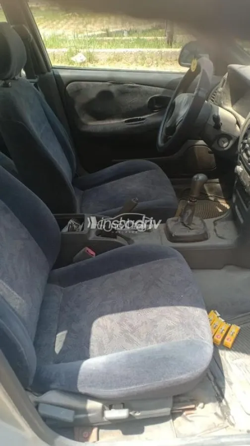 ميتسوبيشي لانسر كرستالة 1999 فضي مستعملة للبيع - 7