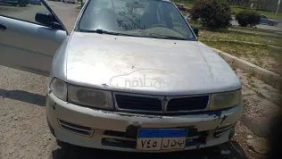 ميتسوبيشي لانسر كرستالة 1999 فضي مستعملة للبيع