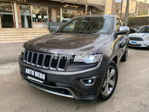 جيب جراند شيروكي 2014 أبيض مستعملة للبيع - 2