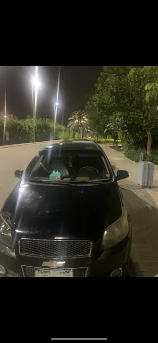 شيفروليه افيو 2014 أبيض مستعملة للبيع