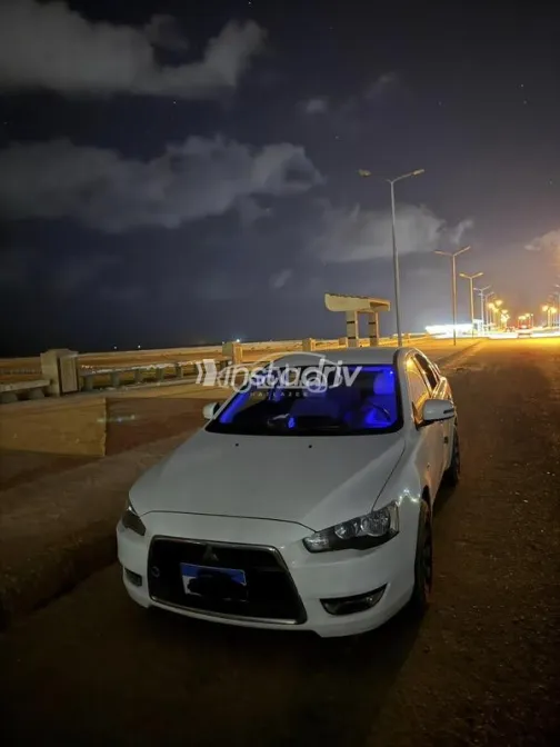 ميتسوبيشي لانسر اى اكس شارك 2016 أبيض مستعملة للبيع - 1