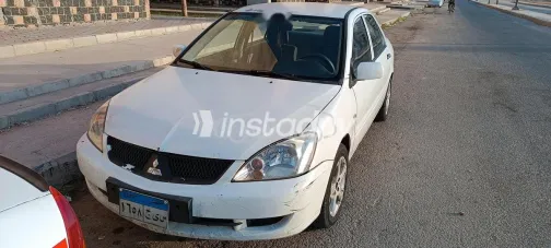 ميتسوبيشي لانسر 2007 أبيض مستعملة للبيع - 1