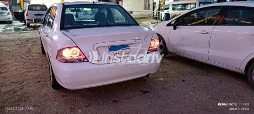 ميتسوبيشي لانسر 2007 أبيض مستعملة للبيع - 6