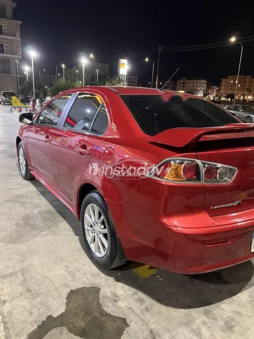 ميتسوبيشي لانسر اى اكس شارك 2016 أحمر مستعملة للبيع - 4
