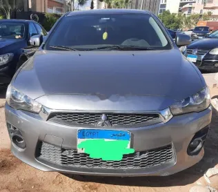 ميتسوبيشي لانسر اى اكس شارك 2018 رمادي مستعملة للبيع