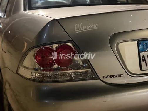 ميتسوبيشي لانسر 2010 ذهبي مستعملة للبيع - 3