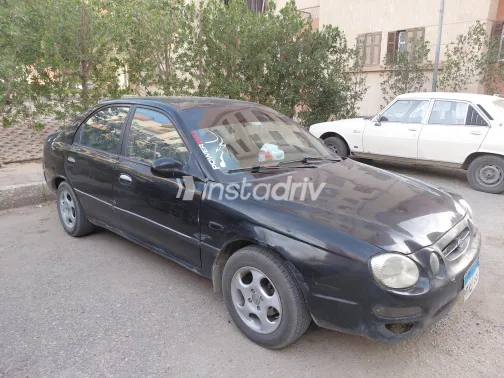 كيا شوما 2000 أبيض مستعملة للبيع - 3