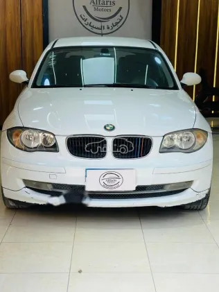 بي ام دبليو 116 2009 أبيض مستعملة للبيع