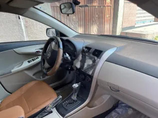 تويوتا كورولا 2013 أبيض مستعملة للبيع