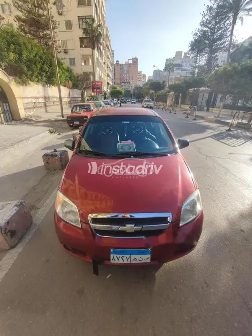 شيفروليه افيو 2011 أحمر غامق مستعملة للبيع - 2