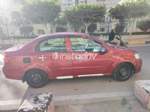 شيفروليه افيو 2011 أحمر غامق مستعملة للبيع - 3