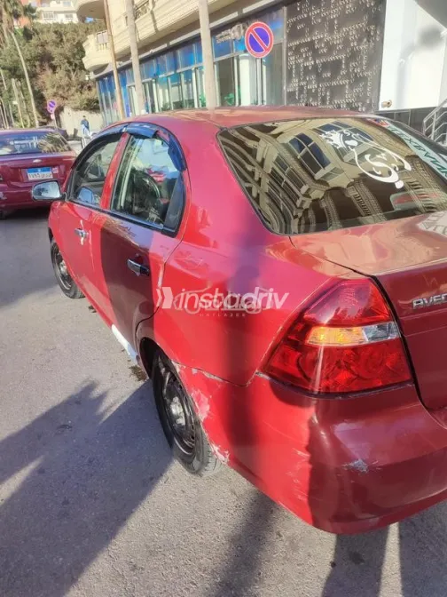 شيفروليه افيو 2011 أحمر غامق مستعملة للبيع - 4