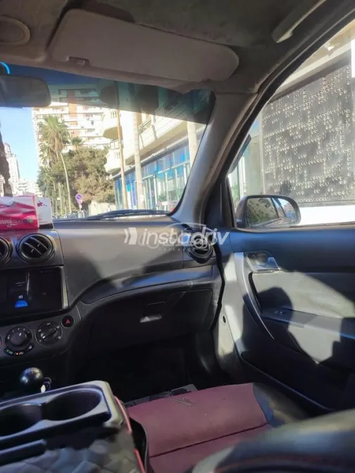 شيفروليه افيو 2011 أحمر غامق مستعملة للبيع - 6