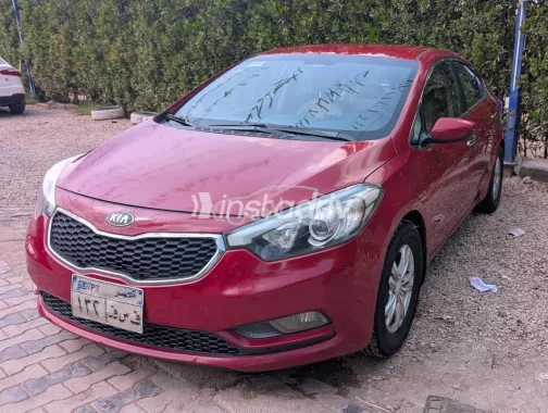 كيا سيراتو 2015 أحمر غامق مستعملة للبيع - 1