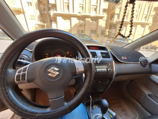 سوزوكى Sx 4 2009 أبيض مستعملة للبيع - 3