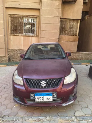 سوزوكى Sx 4 2009 أبيض مستعملة للبيع