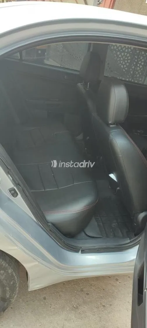 ميتسوبيشي لانسر اى اكس شارك 2014 فضي مستعملة للبيع - 9