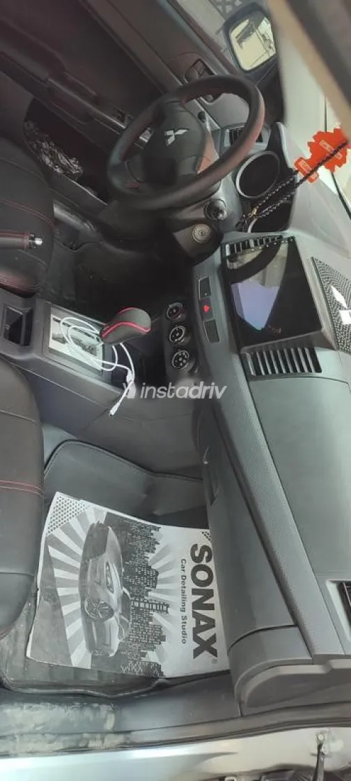 ميتسوبيشي لانسر اى اكس شارك 2014 فضي مستعملة للبيع - 10