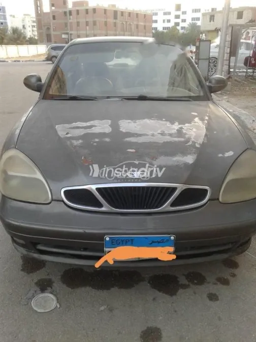 دايو نوبيرا 2003 بني مستعملة للبيع - 2