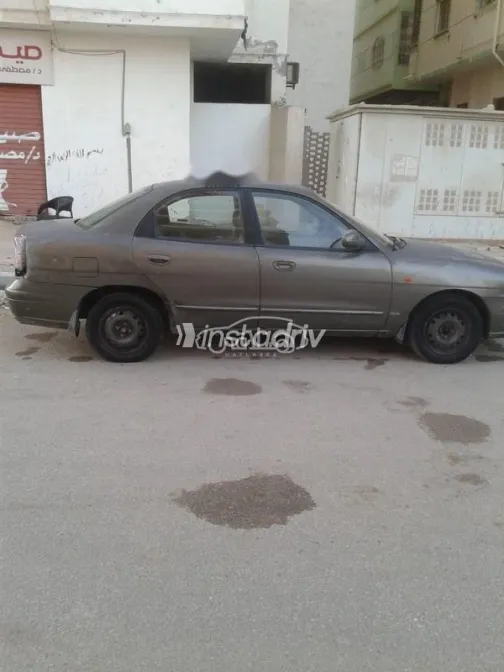 دايو نوبيرا 2003 بني مستعملة للبيع - 4