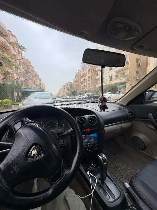 بروتون واجا 2009 أبيض مستعملة للبيع - 7