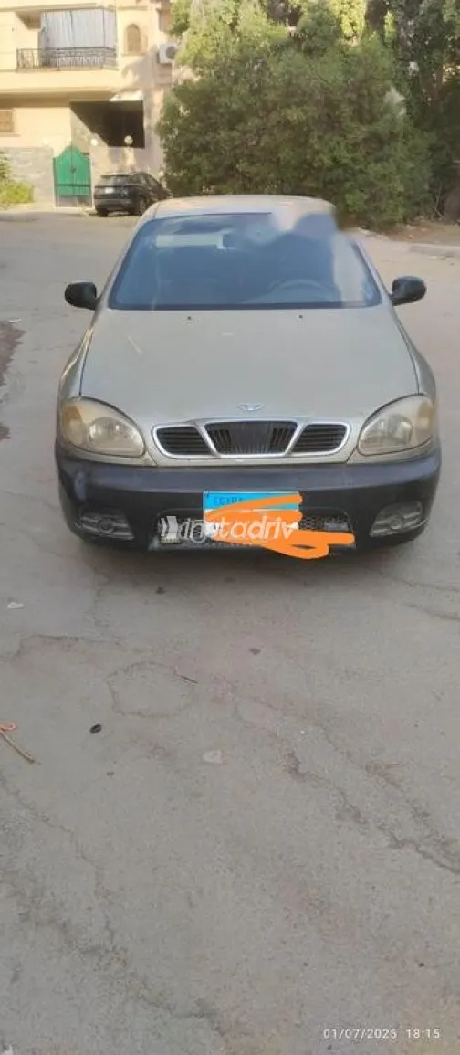 دايو لانوس 1999 ذهبي مستعملة للبيع - 1