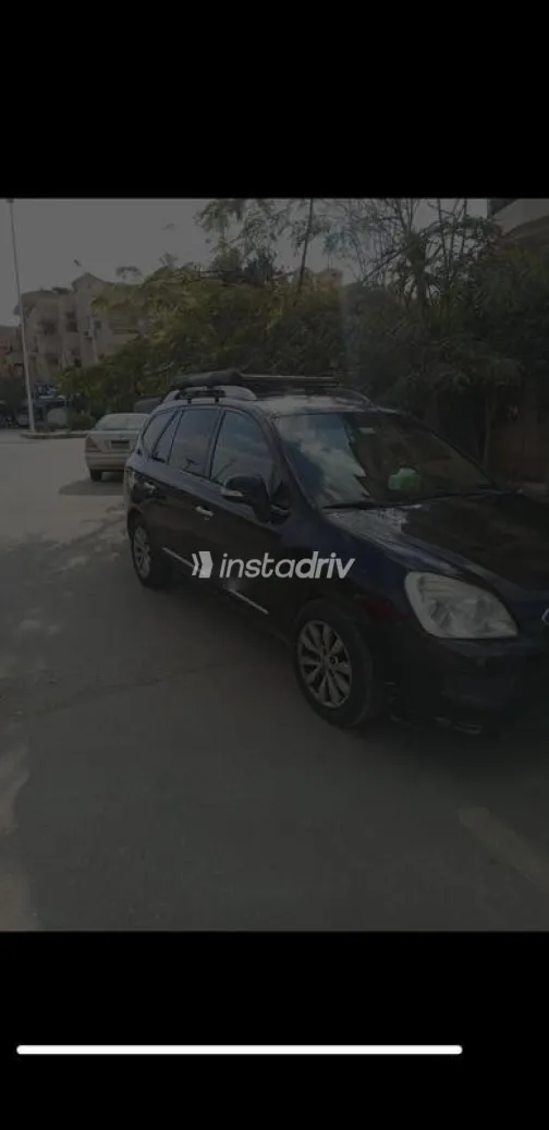 كيا كارينز 2012 أسود مستعملة للبيع - 3