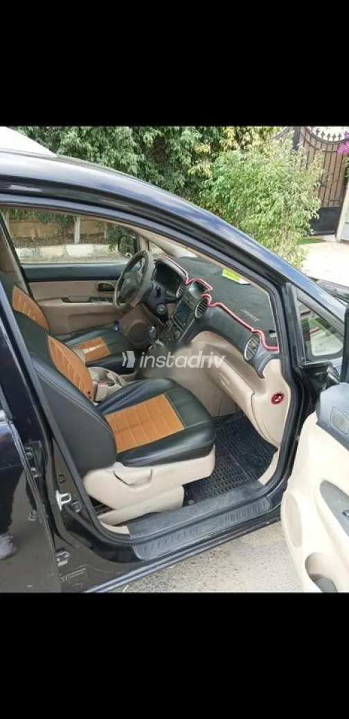 كيا كارينز 2012 أسود مستعملة للبيع - 4