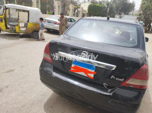نيسان تيدا 2011 أسود مستعملة للبيع - 1