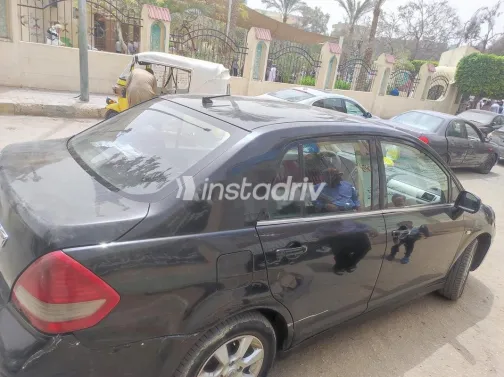 نيسان تيدا 2011 أسود مستعملة للبيع - 7