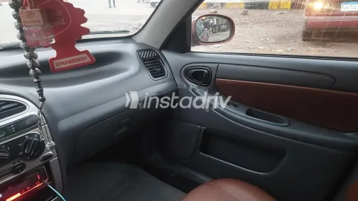 دايو جوليت 2006 أحمر غامق مستعملة للبيع - 1