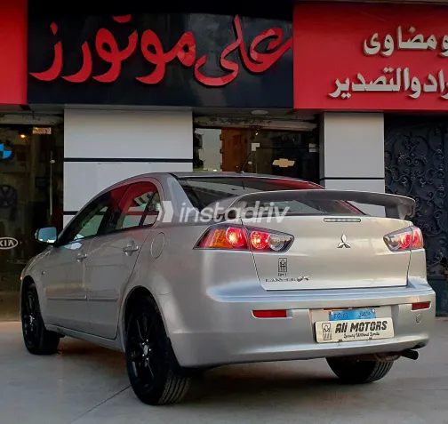 ميتسوبيشي لانسر 2016 أبيض مستعملة للبيع - 6