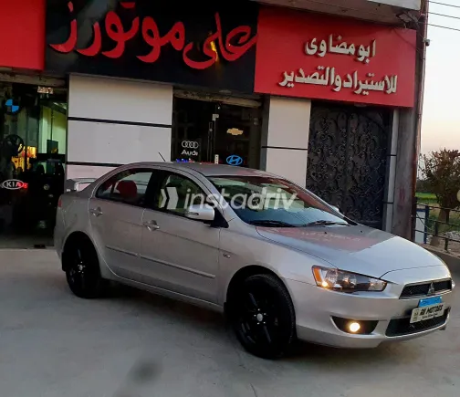 ميتسوبيشي لانسر 2016 أبيض مستعملة للبيع - 7