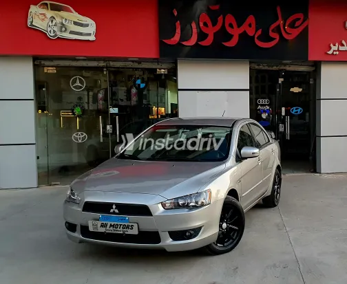 ميتسوبيشي لانسر 2016 أبيض مستعملة للبيع - 8