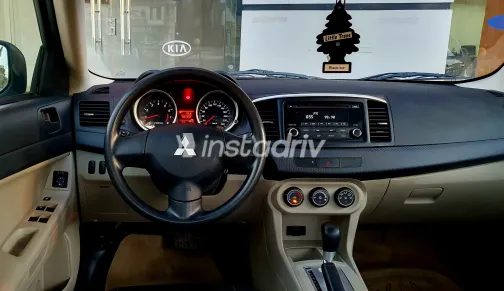 ميتسوبيشي لانسر 2016 أبيض مستعملة للبيع - 9