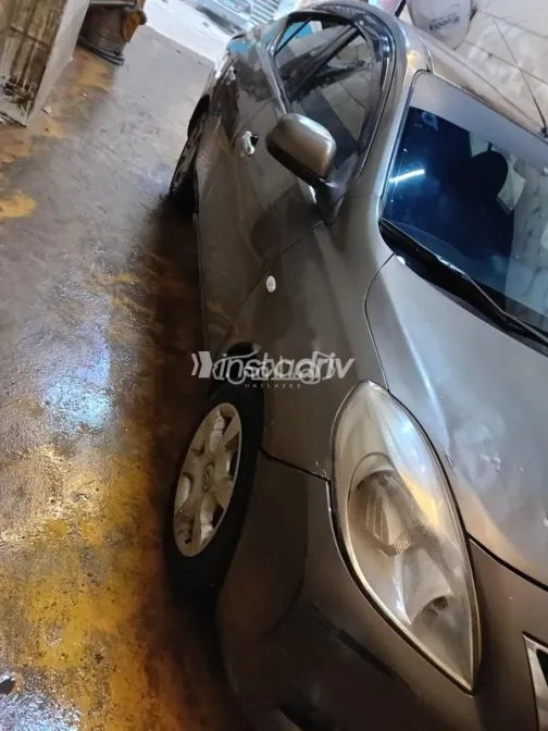 نيسان صنى 2013 برونزي مستعملة للبيع - 6