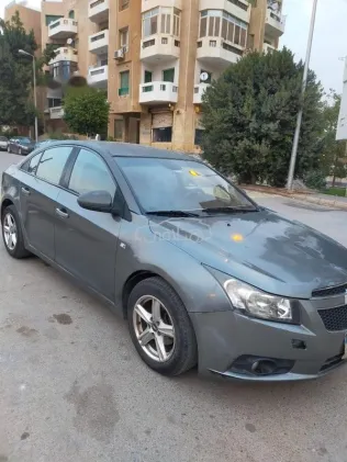 شيفروليه كروز 2010 رمادي غامق مستعملة للبيع