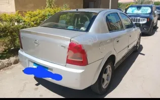 اوبل أسترا 2005 أبيض مستعملة للبيع