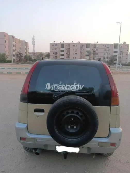 دايهاتسو تيريوس 1999 ذهبي مستعملة للبيع - 3